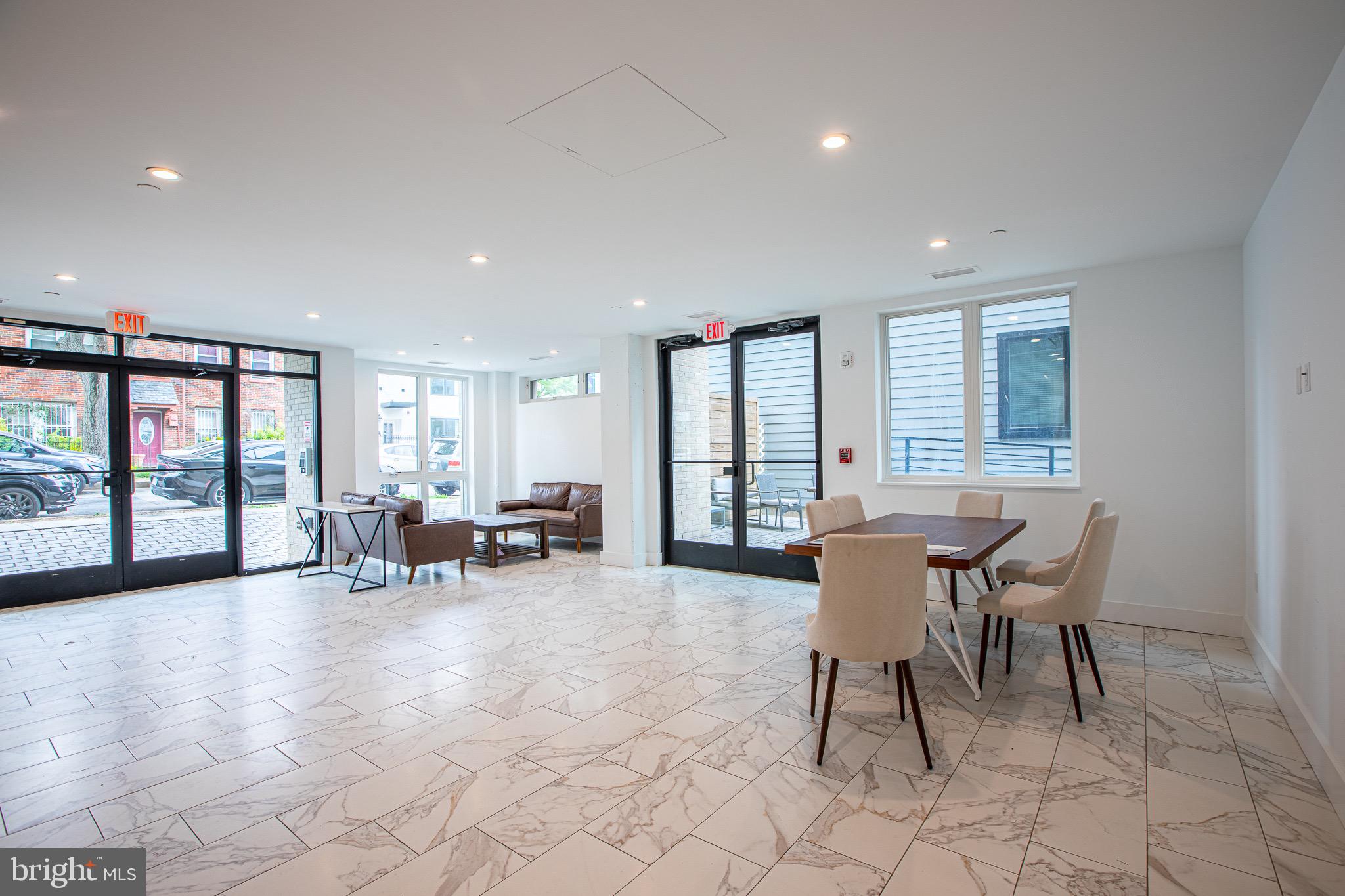 1016 17th Place Northeast, Unit 8 Washington, DC 20002 - Photo 7 of 21 a view of a dining room with furniture and chandelier