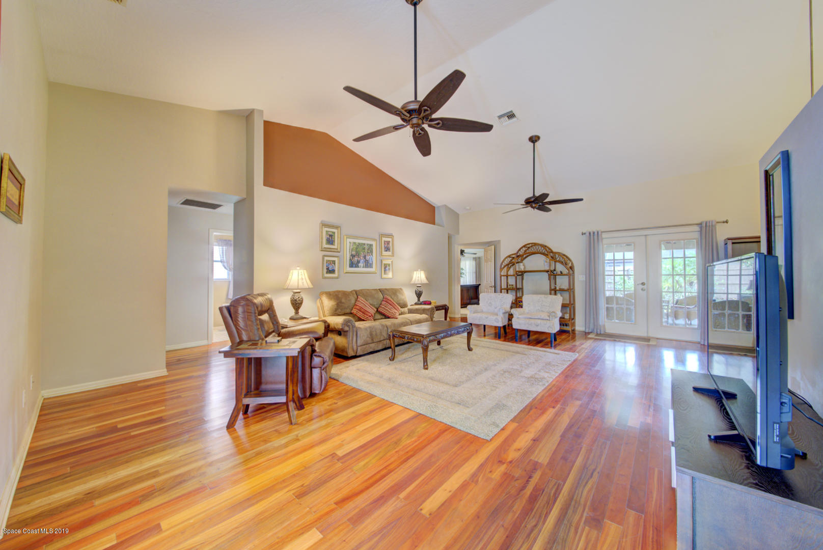 1235 Pemberton Trail Malabar, FL 32950 - Photo 11 of 32 living room with french doors to porch