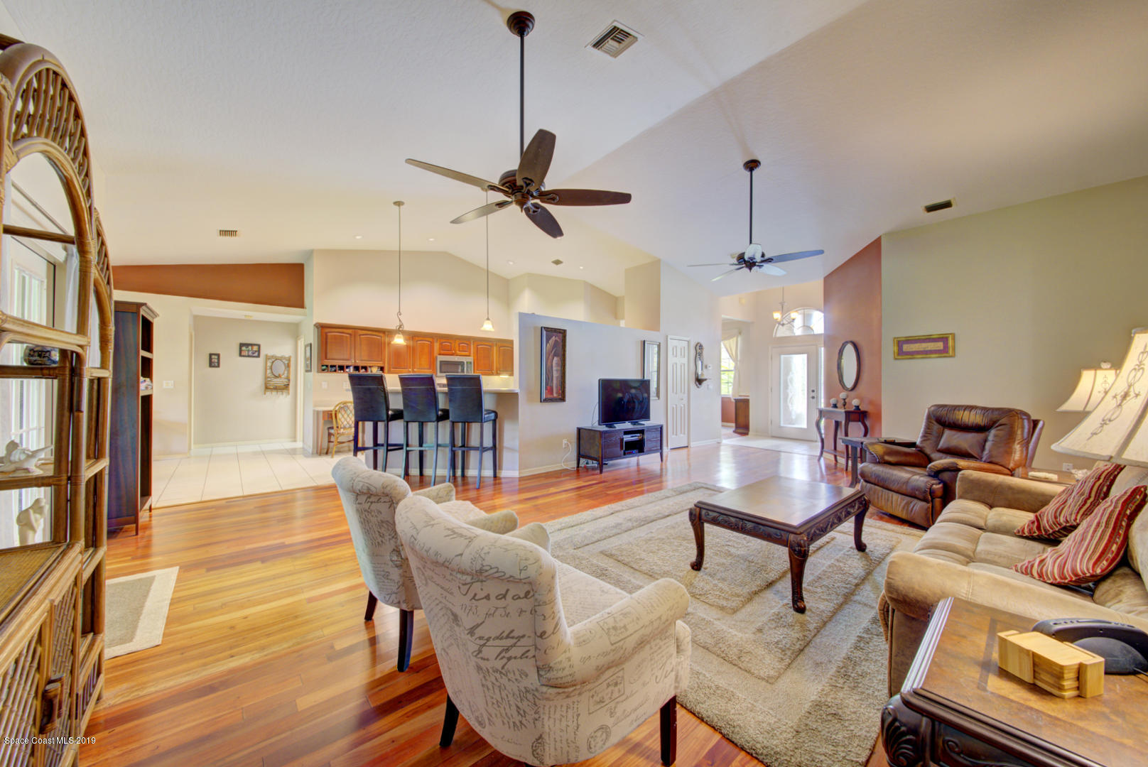 1235 Pemberton Trail Malabar, FL 32950 - Photo 13 of 32 living room open to kitchen