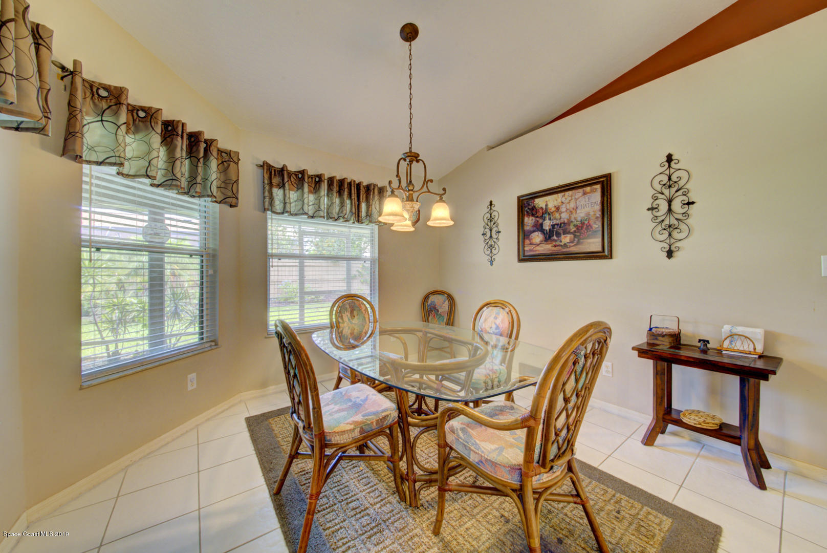 1235 Pemberton Trail Malabar, FL 32950 - Photo 14 of 32 breakfast nook with plant shelf
