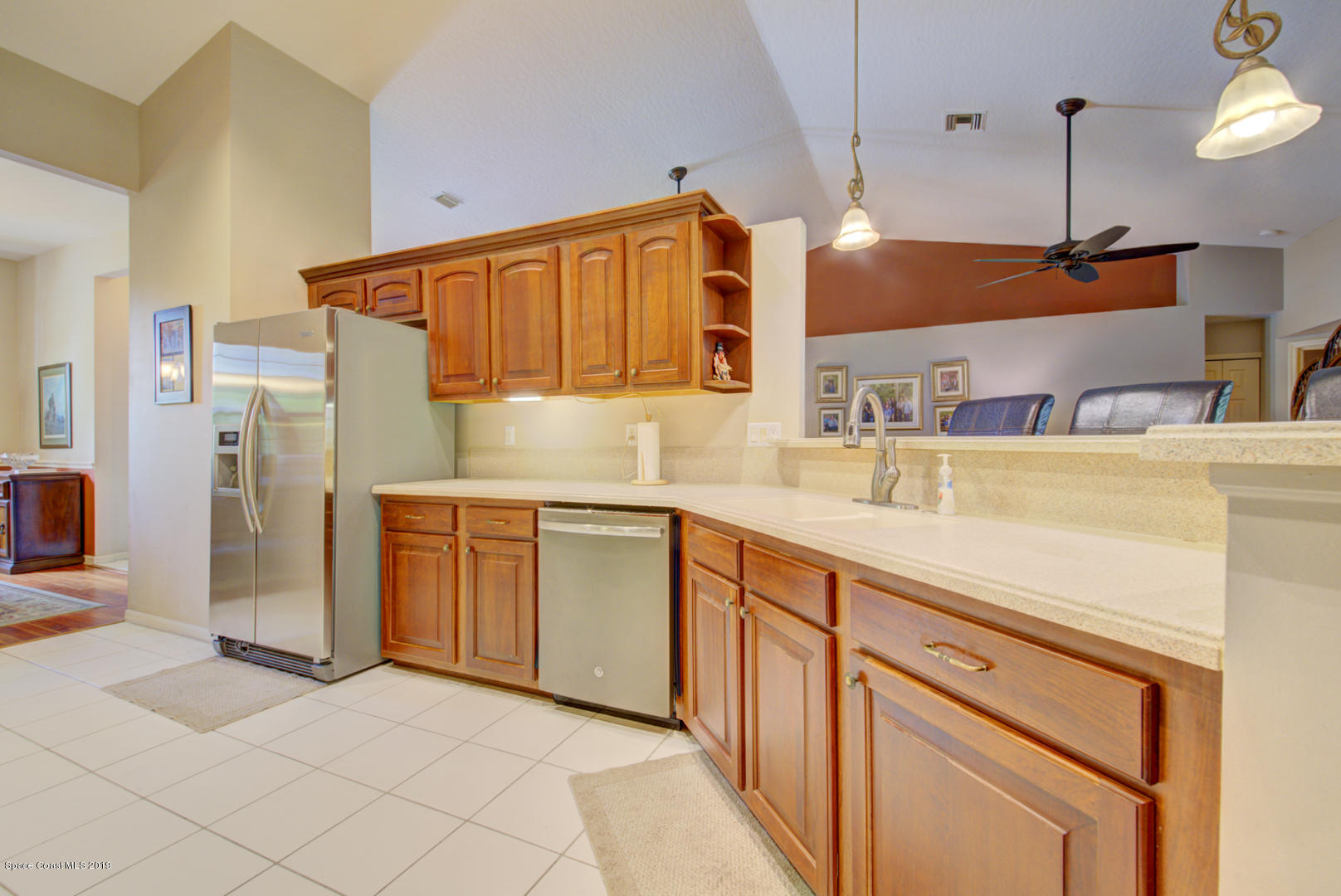 1235 Pemberton Trail Malabar, FL 32950 - Photo 16 of 32 kitchen with vaulted ceiling
