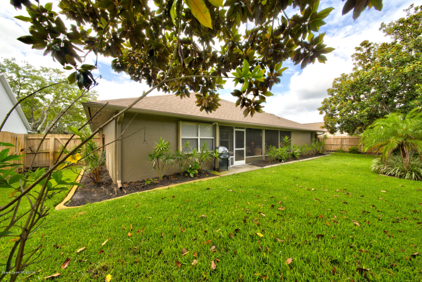 1235 Pemberton Trail Malabar, FL 32950 - Photo 30 of 32 back of house left