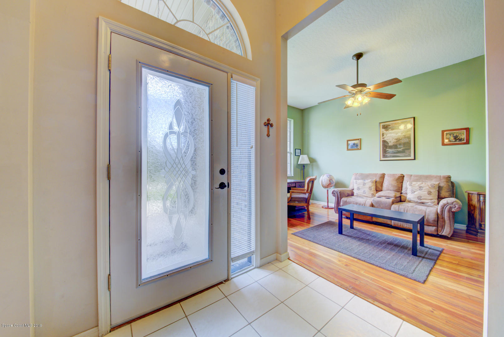 1235 Pemberton Trail Malabar, FL 32950 - Photo 8 of 32 foyer with glass door