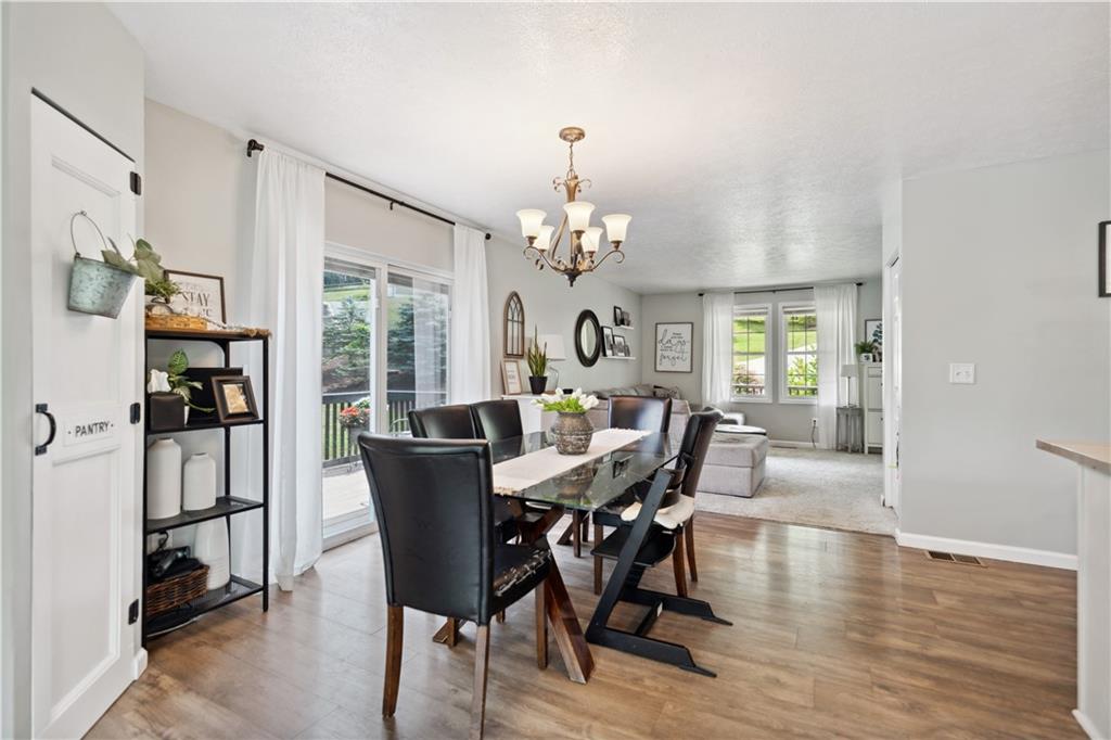 65 Wilson Avenue Cecil, PA 15321 - Photo 11 of 43 The beautiful floors flow through this space...