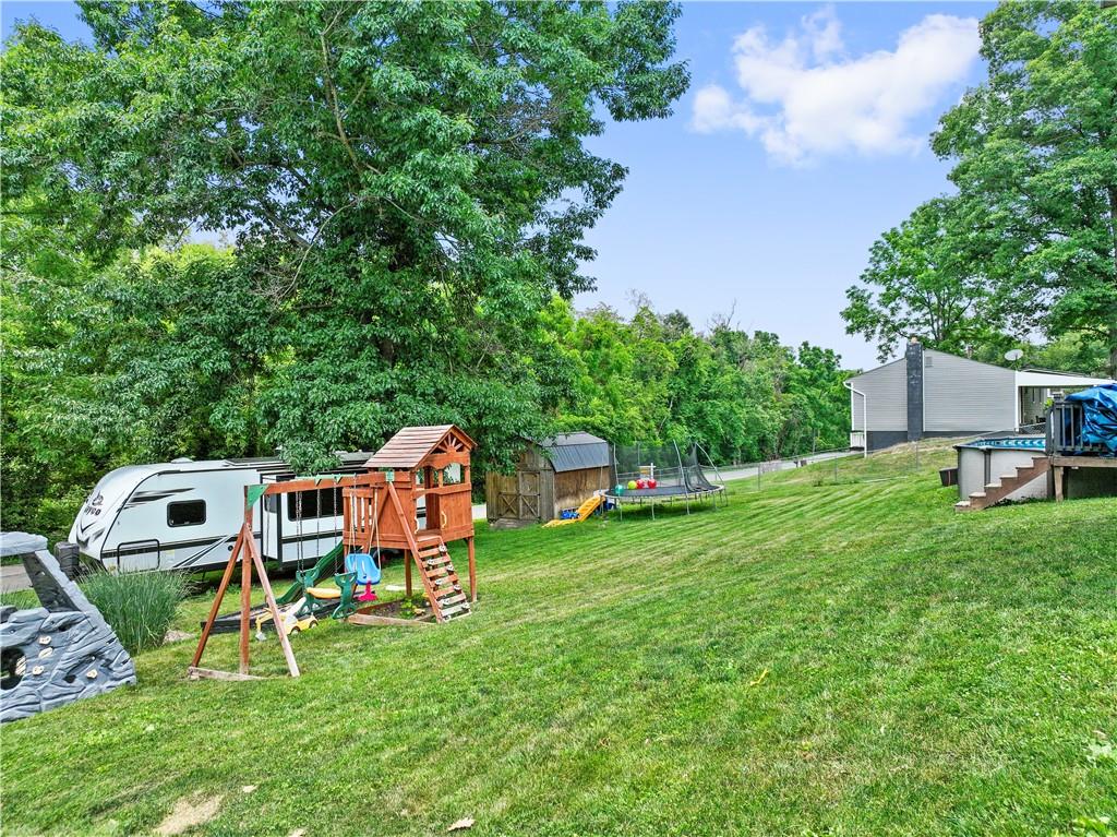 65 Wilson Avenue Cecil, PA 15321 - Photo 39 of 43 Playset stays! There is a storage shed too!!