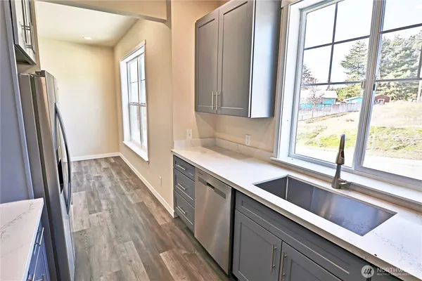 a view of a kitchen from a window