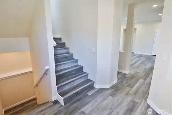 a view of entryway with wooden floor