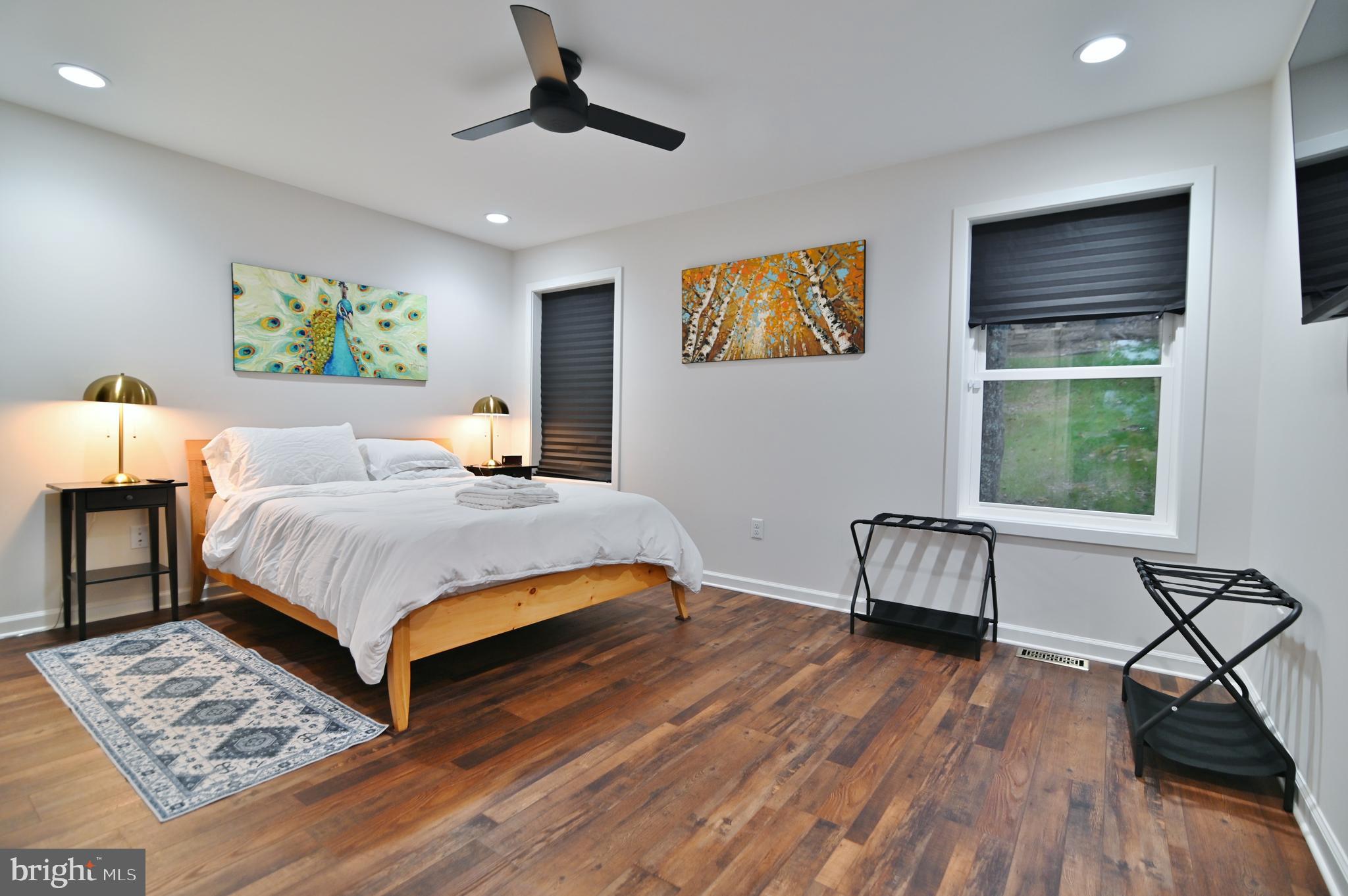 5448 Crooked Run Road Mount Jackson, VA 22842 - Photo 22 of 67 a bedroom with a bed and a desk