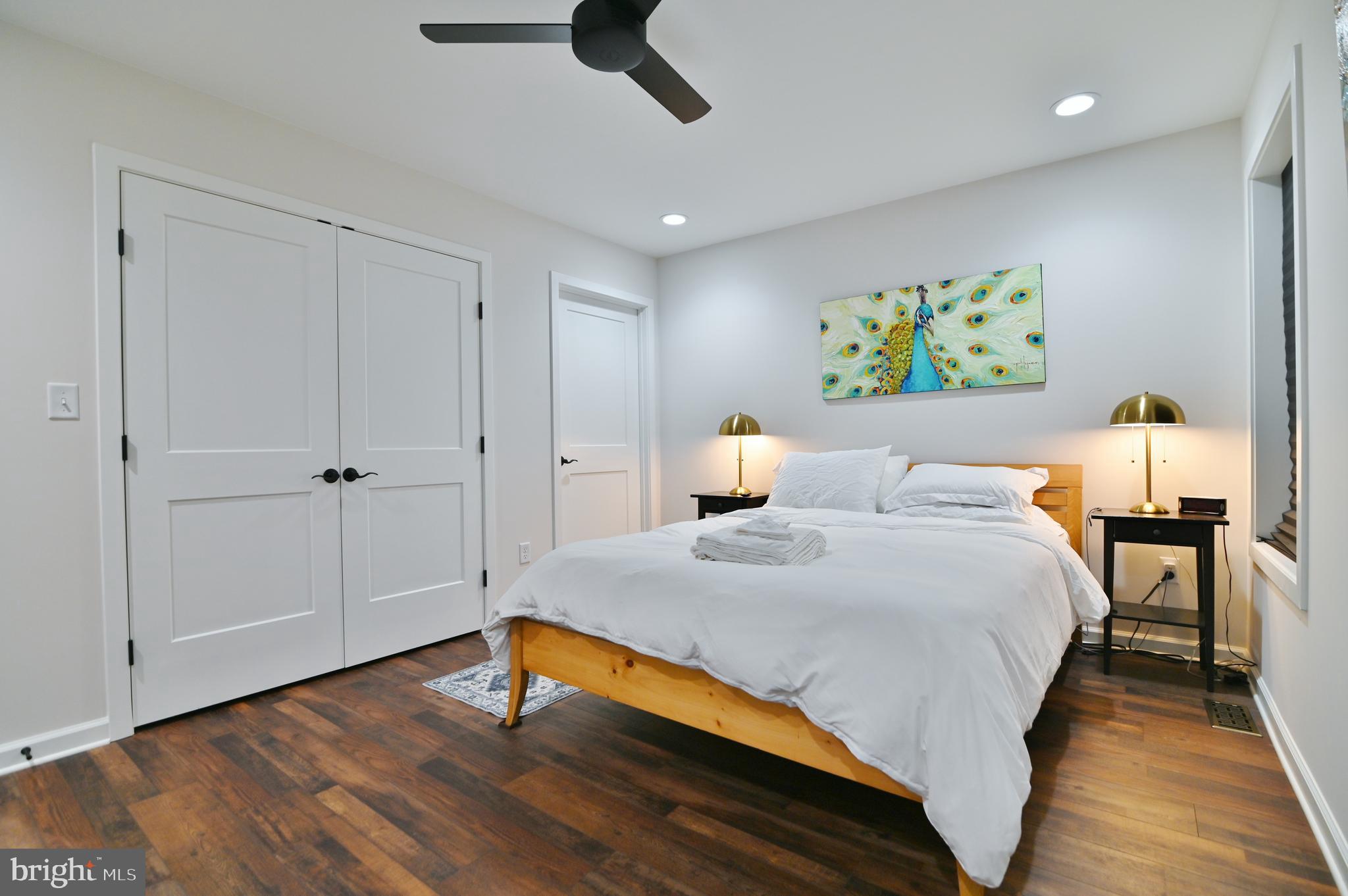 5448 Crooked Run Road Mount Jackson, VA 22842 - Photo 24 of 67 a bedroom with a bed and wooden floor