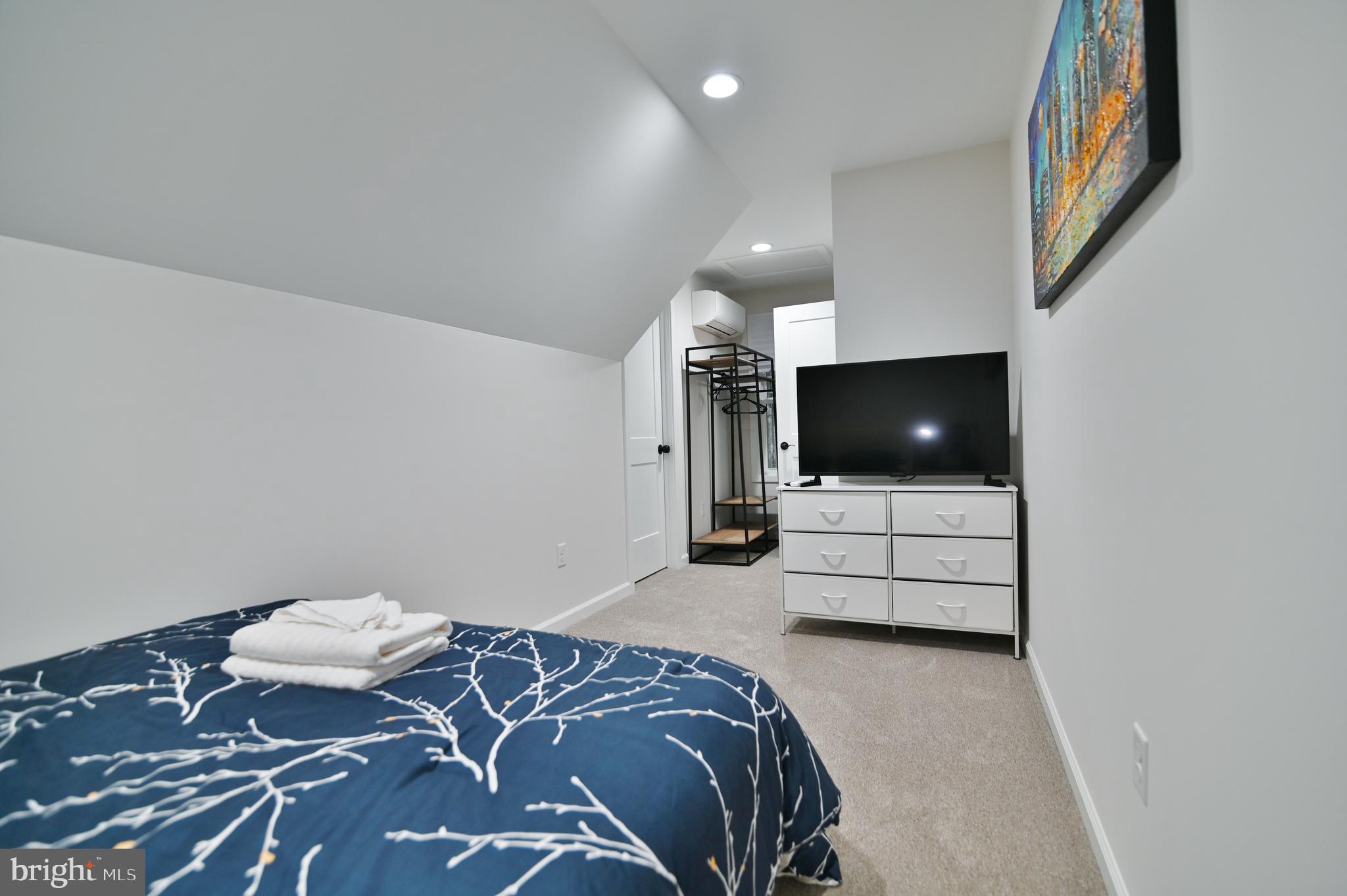 5448 Crooked Run Road Mount Jackson, VA 22842 - Photo 34 of 67 a living room with a couch and a flat screen tv