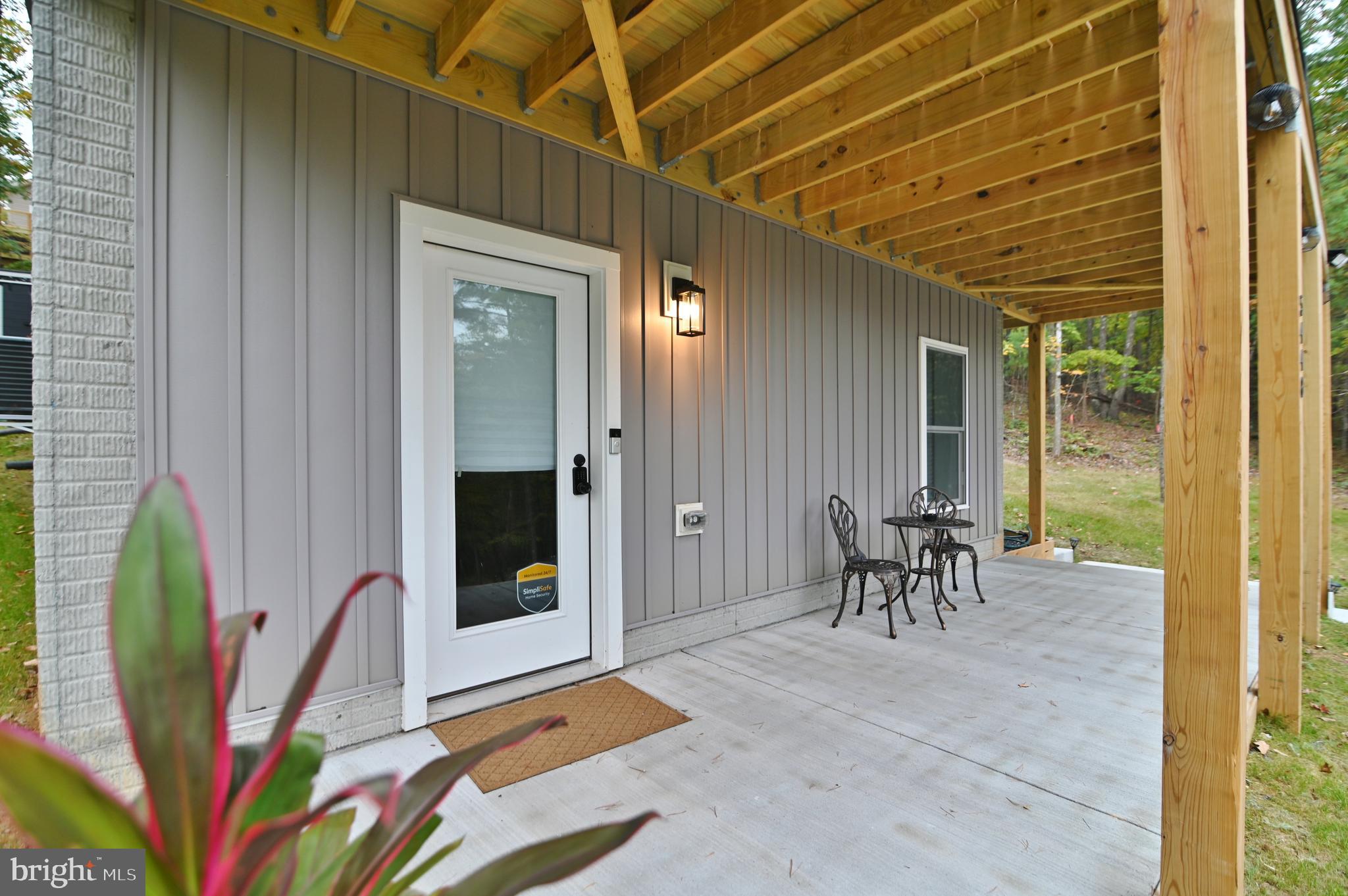 5448 Crooked Run Road Mount Jackson, VA 22842 - Photo 43 of 67 a view of a patio with table and chairs