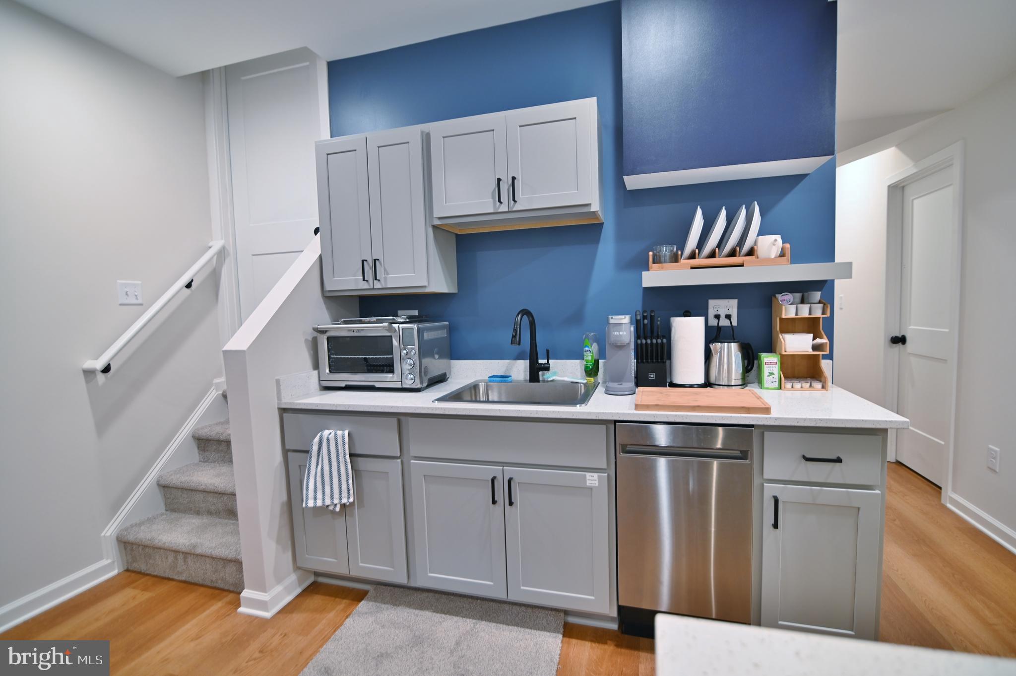 5448 Crooked Run Road Mount Jackson, VA 22842 - Photo 47 of 67 a kitchen with cabinets and wooden floor