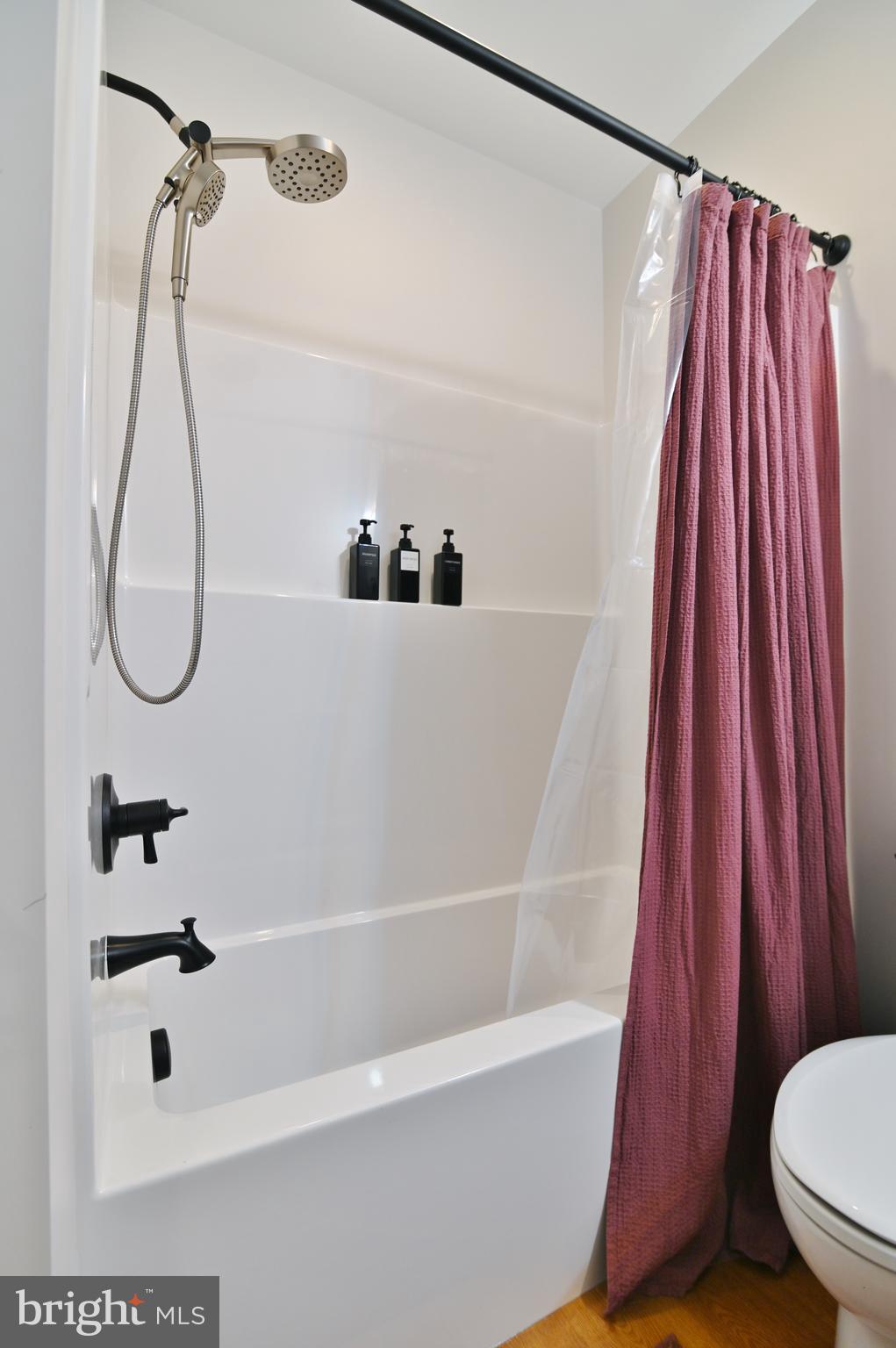 5448 Crooked Run Road Mount Jackson, VA 22842 - Photo 52 of 67 a bathroom with a shower a bath tub and a shower