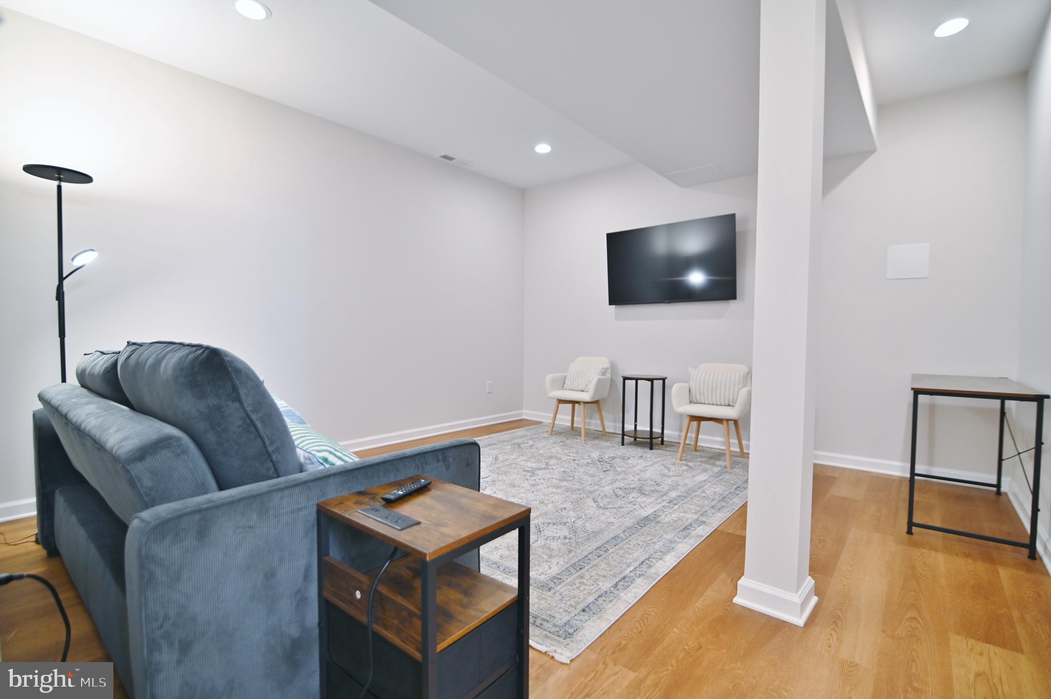 5448 Crooked Run Road Mount Jackson, VA 22842 - Photo 53 of 67 a living room with furniture and a flat screen tv