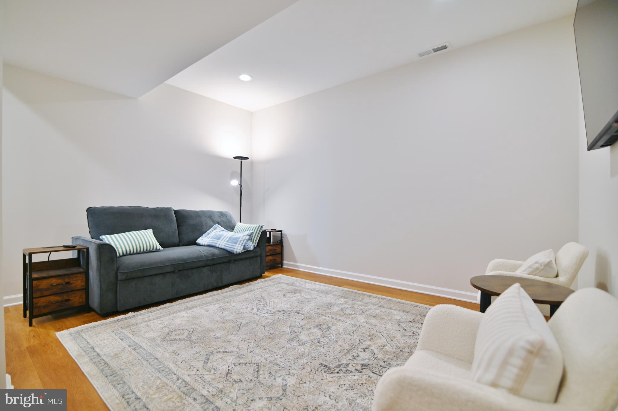 5448 Crooked Run Road Mount Jackson, VA 22842 - Photo 54 of 67 a living room with furniture and a lamp