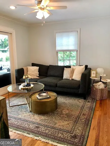 a living room with furniture and a couch