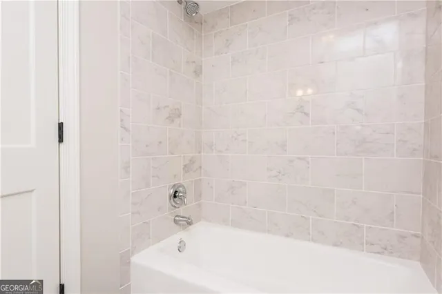 a bathroom with a bathtub