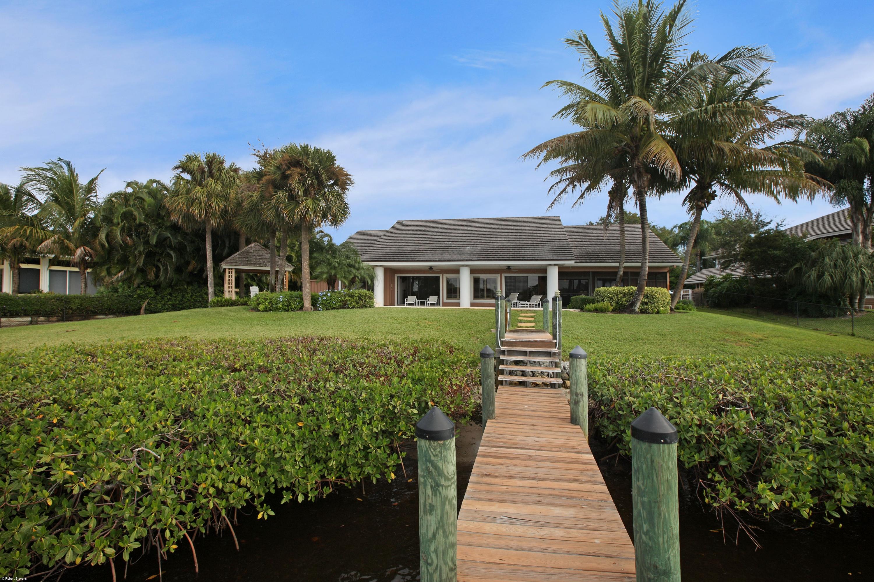 18767 Southeast River Ridge Road Tequesta, FL 33469 - Photo 24 of 27 Exterior Back View