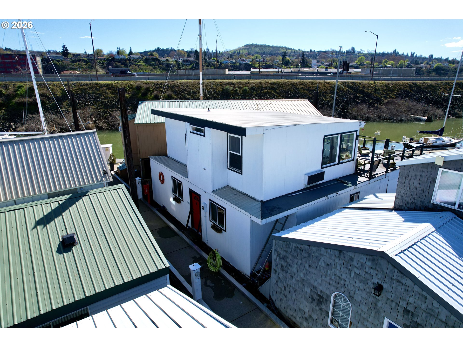 101 North Boat Basin Road, Unit C3 The Dalles, OR 97058 - Photo 1 of 44 a view of a roof deck with couches