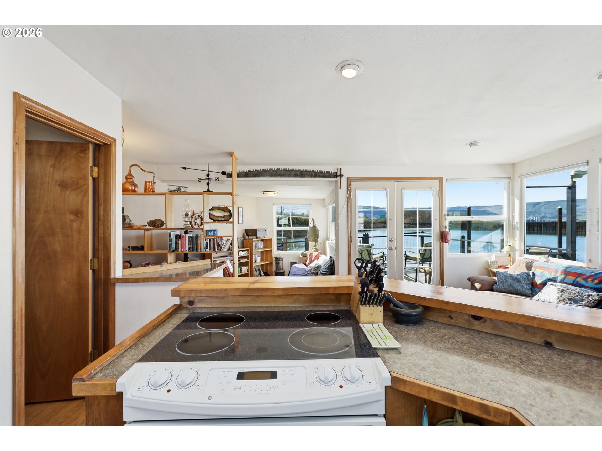 101 North Boat Basin Road, Unit C3 The Dalles, OR 97058 - Photo 17 of 44 a living room with furniture and large windows