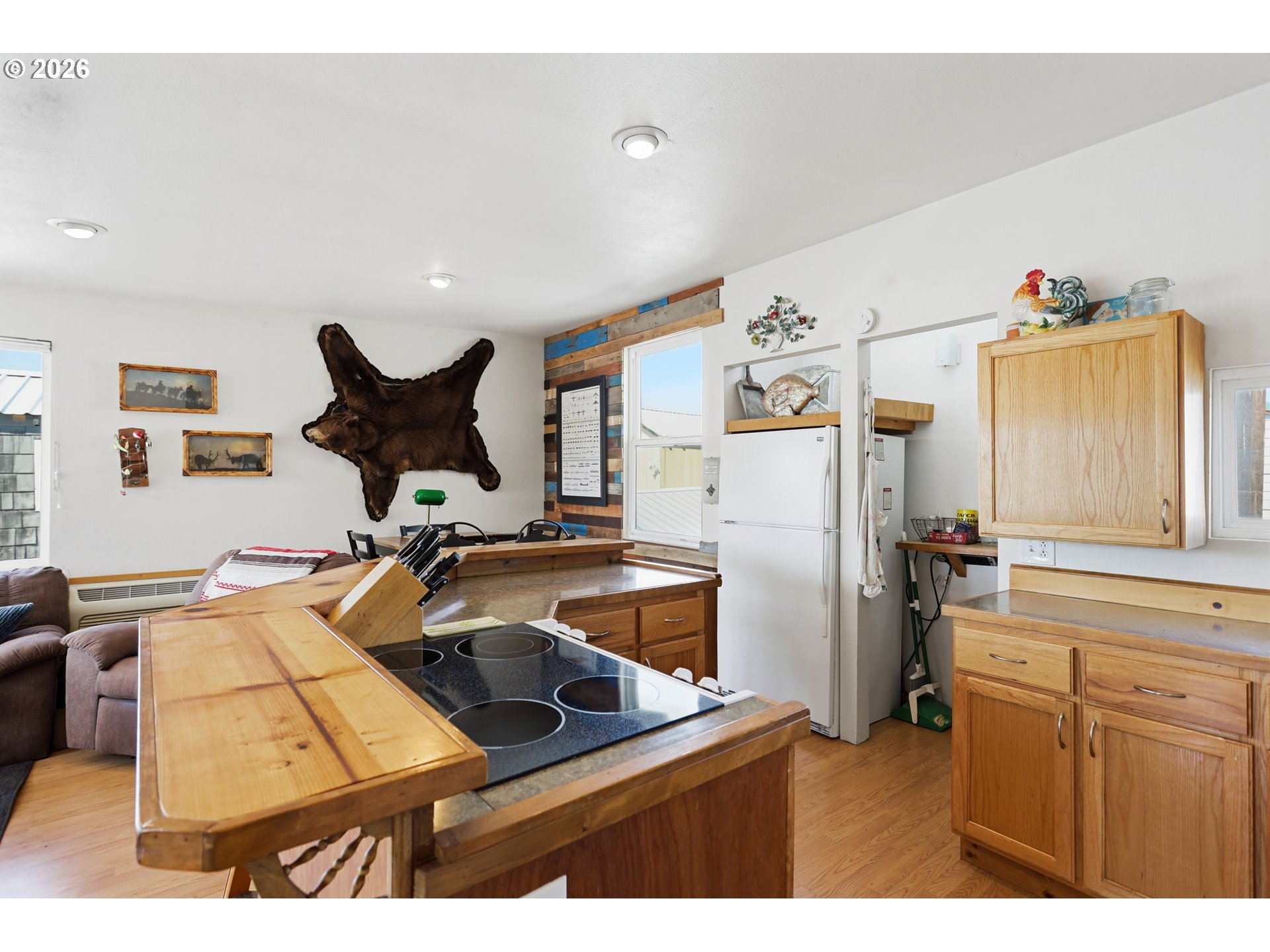 101 North Boat Basin Road, Unit C3 The Dalles, OR 97058 - Photo 18 of 44 a kitchen with refrigerator and window
