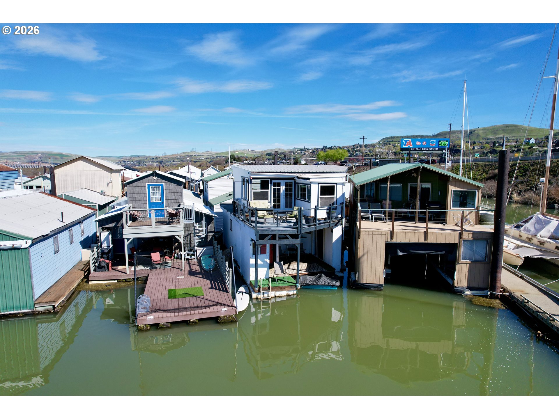 101 North Boat Basin Road, Unit C3 The Dalles, OR 97058 - Photo 2 of 44 a view of house with swimming pool yard and outdoor seating