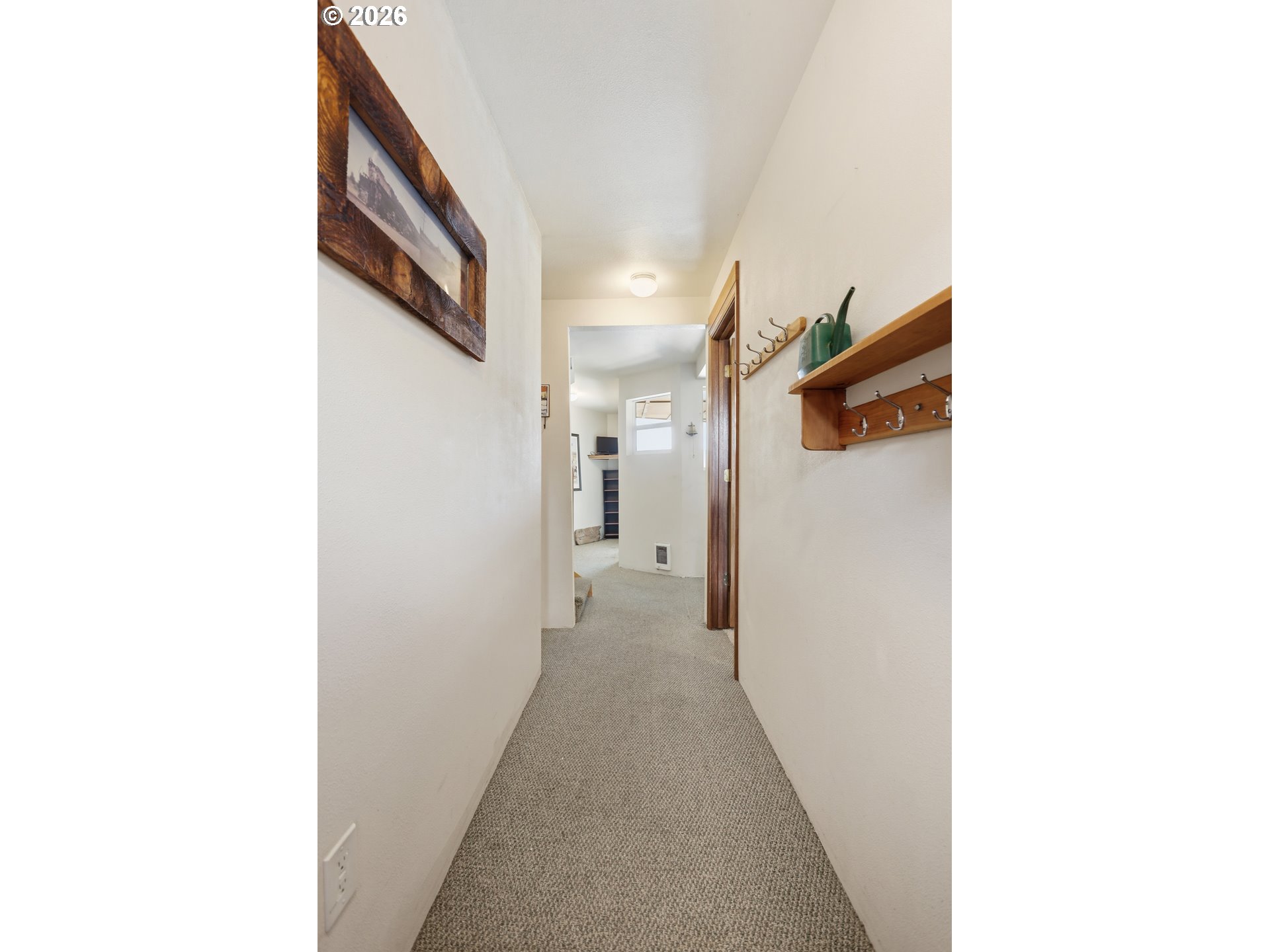 101 North Boat Basin Road, Unit C3 The Dalles, OR 97058 - Photo 23 of 44 a view of a hallway with wooden floor