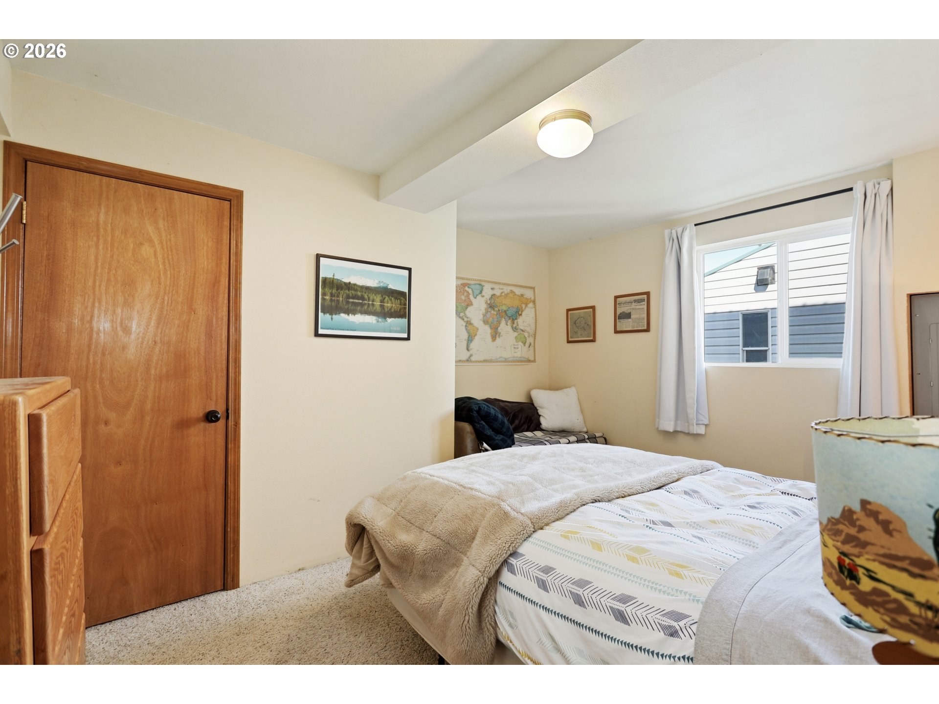 101 North Boat Basin Road, Unit C3 The Dalles, OR 97058 - Photo 24 of 44 a bedroom with a bed and a window