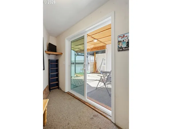 a view of livingroom with furniture and window