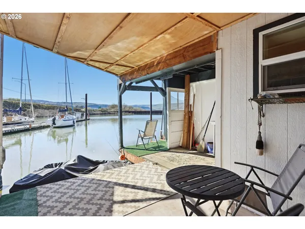a view of a patio with chair and table