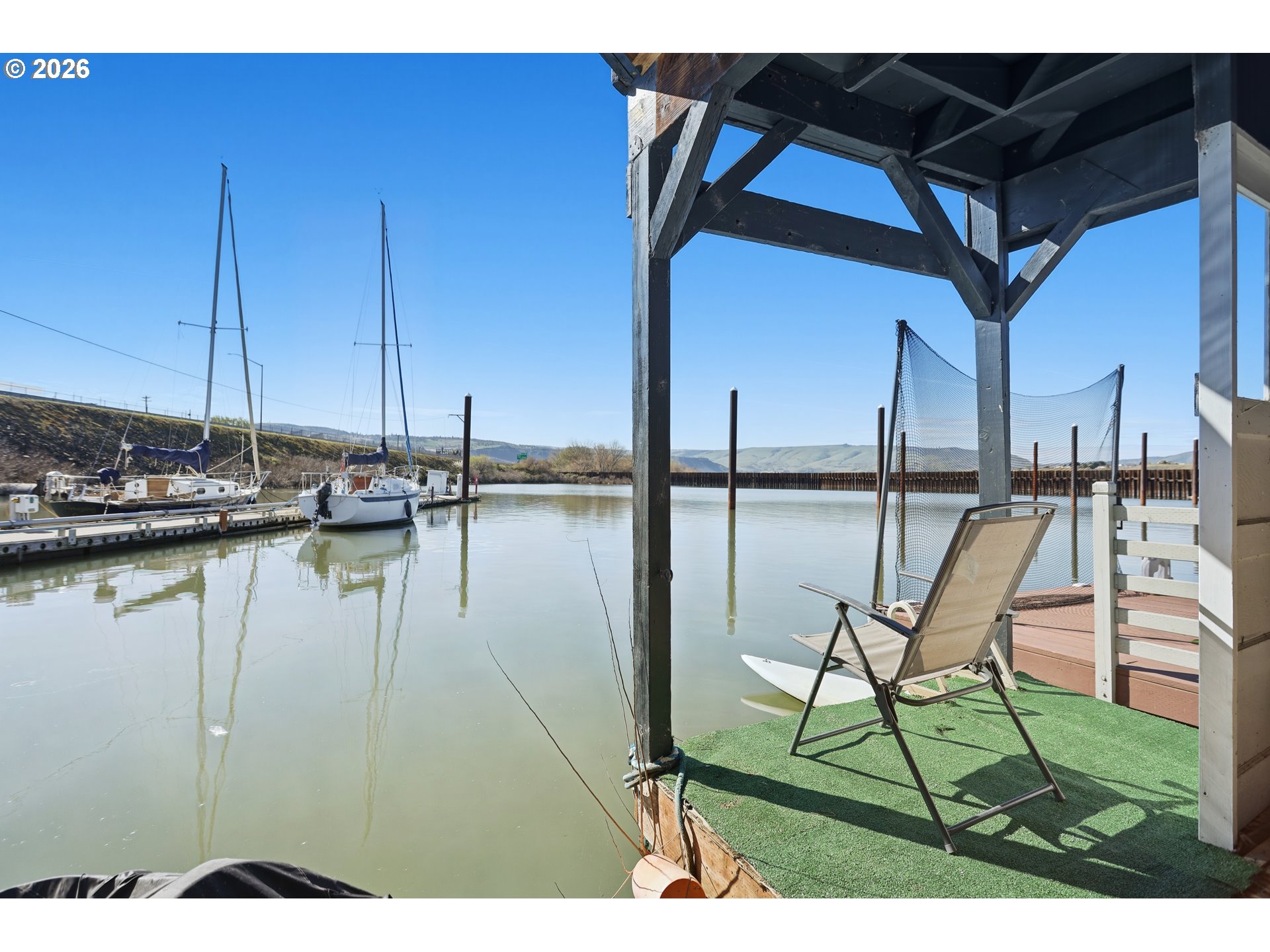 101 North Boat Basin Road, Unit C3 The Dalles, OR 97058 - Photo 36 of 44 a view of a swimming pool with outdoor seating