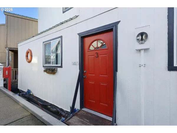 a view of a door and car in a room