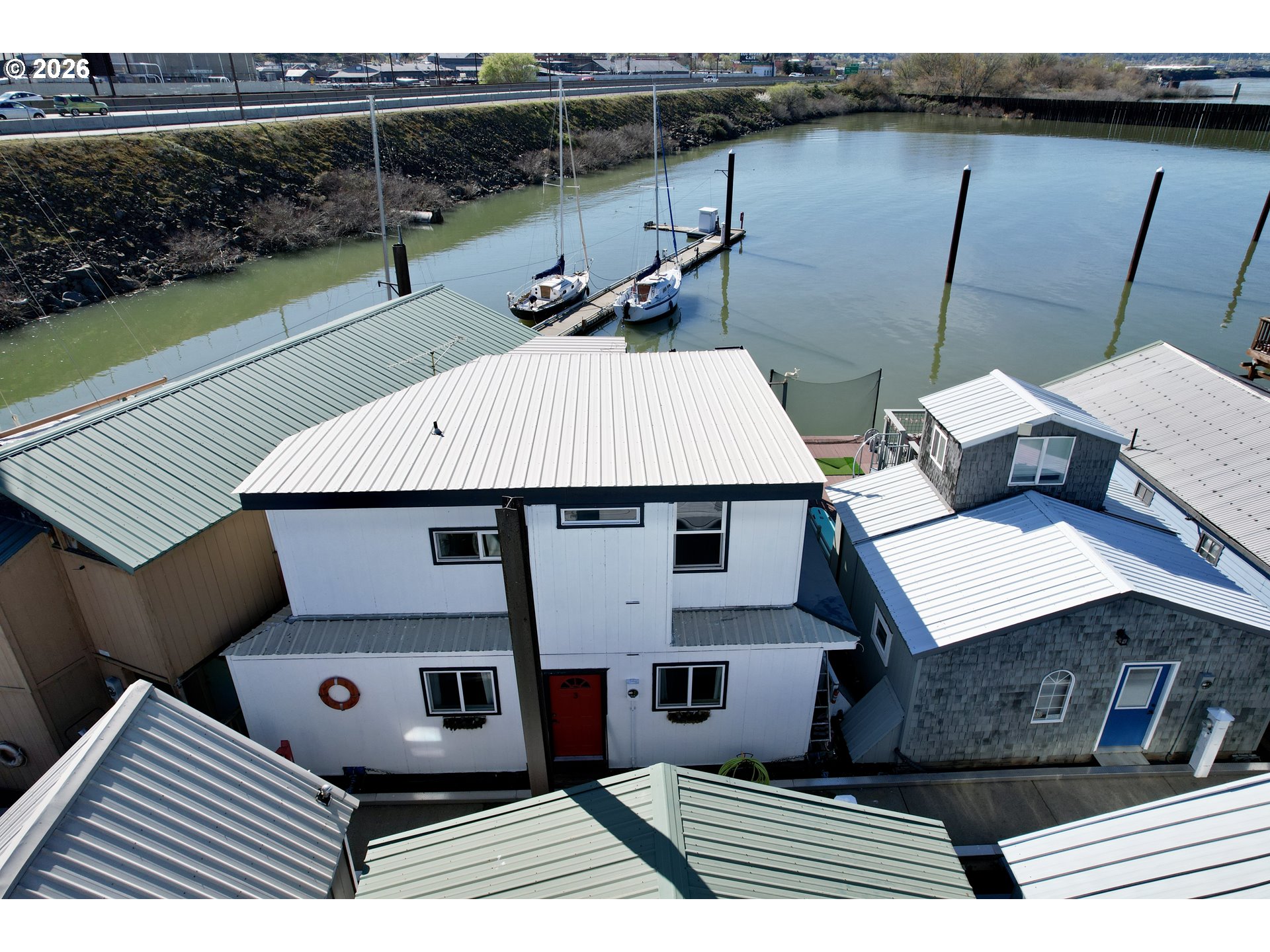 101 North Boat Basin Road, Unit C3 The Dalles, OR 97058 - Photo 44 of 44 a view of a terrace with furniture and garden