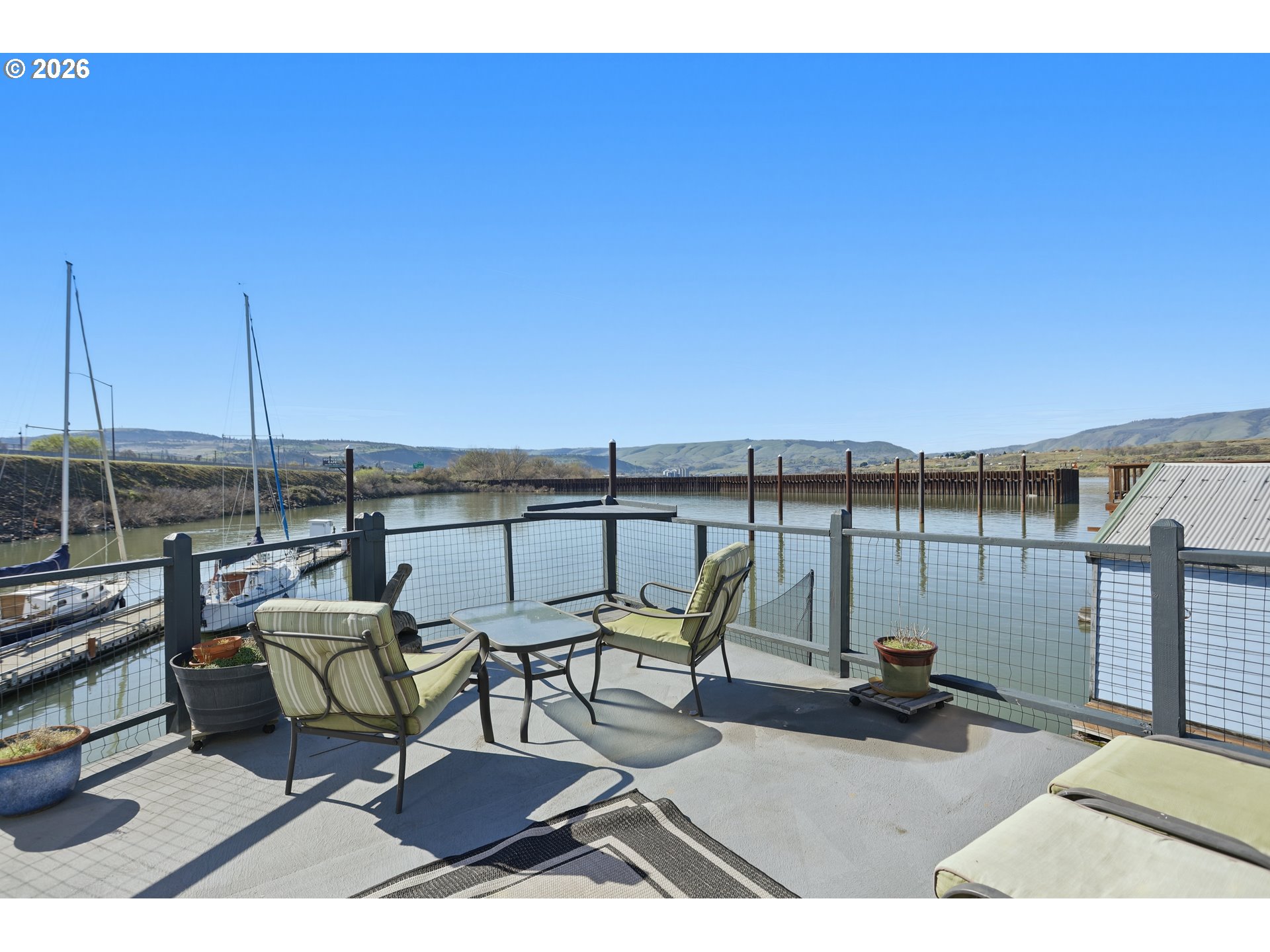 101 North Boat Basin Road, Unit C3 The Dalles, OR 97058 - Photo 8 of 44 a view of a terrace with chairs