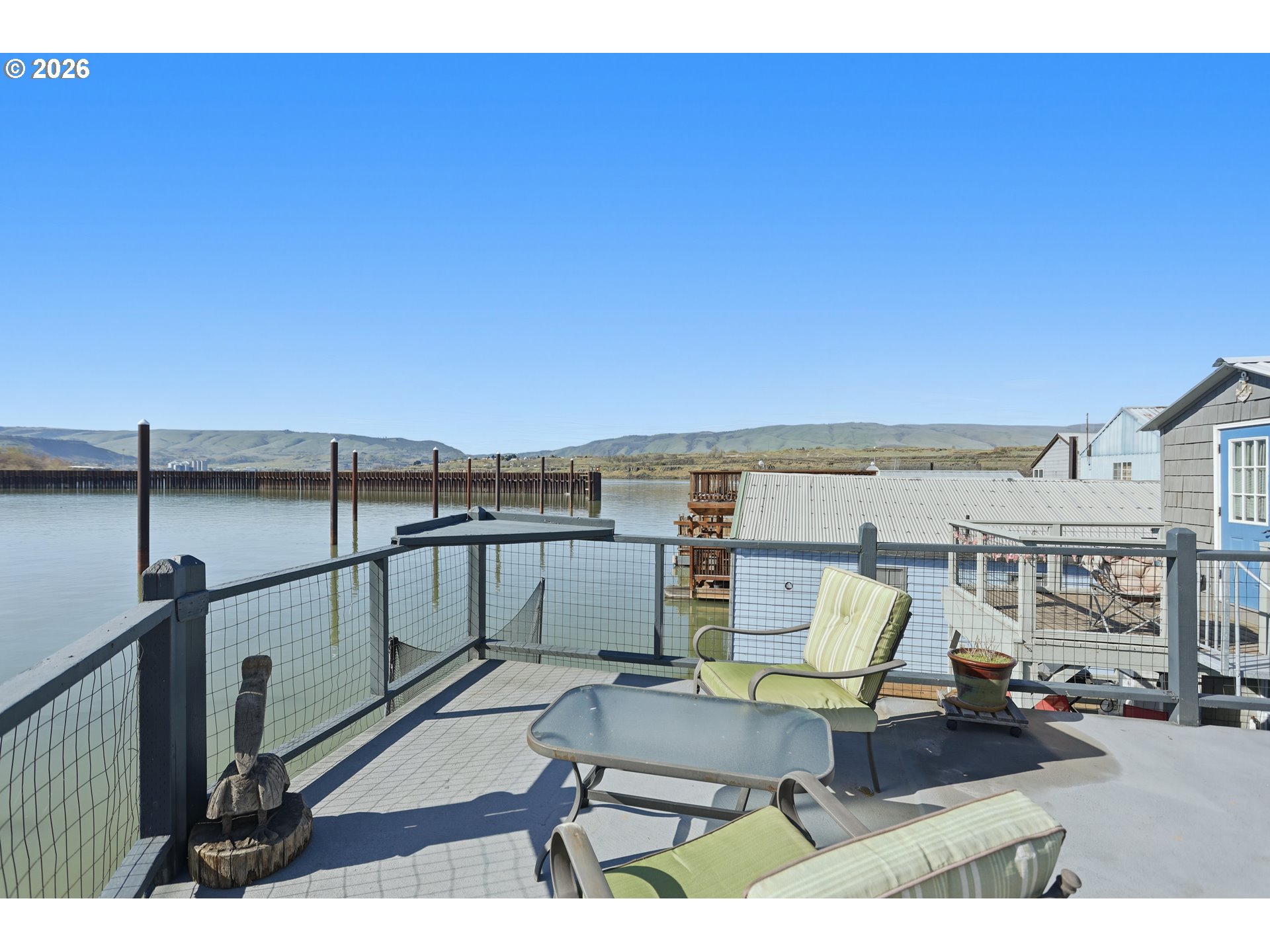 101 North Boat Basin Road, Unit C3 The Dalles, OR 97058 - Photo 9 of 44 a view of a terrace with furniture and stove