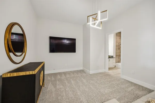 a bathroom with a bathtub and a sink