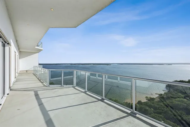 a view of a lake from a balcony