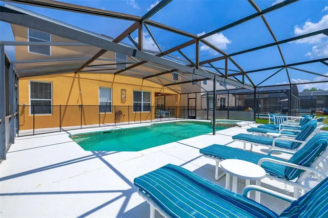 a living room with furniture a window and a table