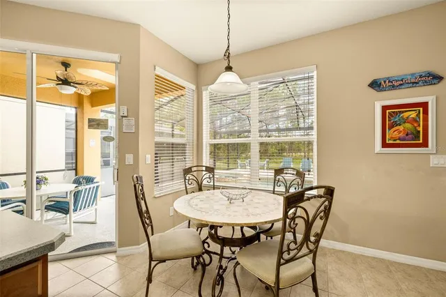 a living room with furniture a rug and a flat screen tv