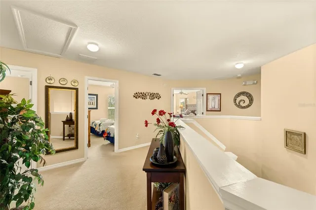 a bedroom with two beds and a window