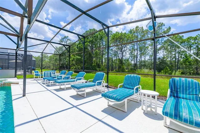 a view of yard with a patio