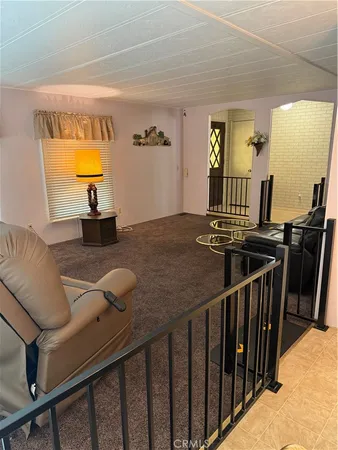 a view of a balcony and trees