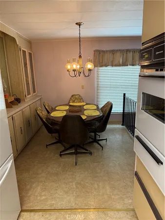 a room with furniture and a flat screen tv