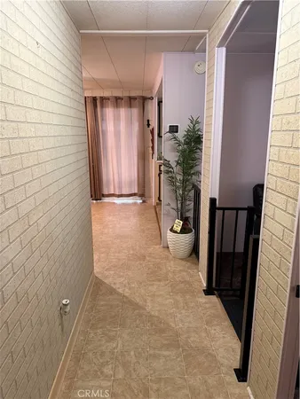 a view of a porch with wooden floor and stairs