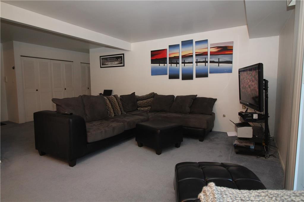 553 Sloop Road, Unit 41 Pittsburgh, PA 15237 - Photo 3 of 21 Comfortable Open Floor Plan Allows for Creative Use of Space between Entry, Living Room, and Dining Room.