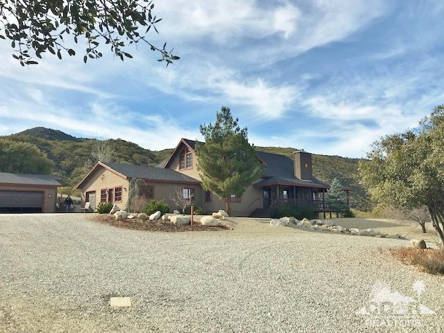 59373 Hop Patch Spring Road Mountain Center, CA 92561 - Photo 1 of 41 a view of house with a yard covered in snow