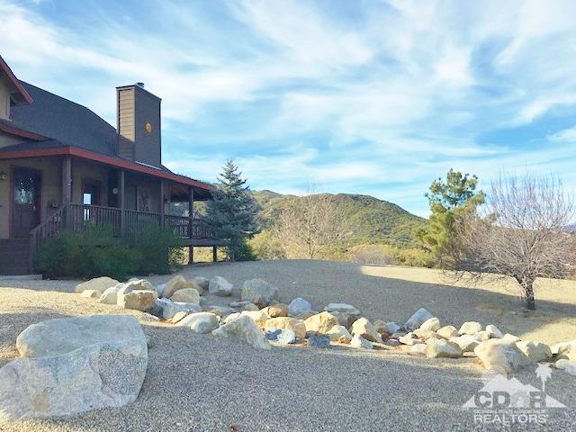 59373 Hop Patch Spring Road Mountain Center, CA 92561 - Photo 2 of 41 a view of a terrace with furniture