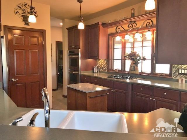 59373 Hop Patch Spring Road Mountain Center, CA 92561 - Photo 11 of 41 a kitchen with a sink and a window