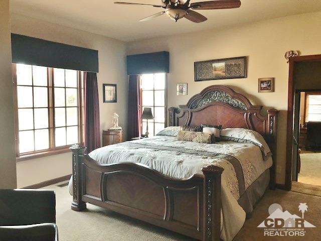 59373 Hop Patch Spring Road Mountain Center, CA 92561 - Photo 14 of 41 a bedroom with a bed and a window