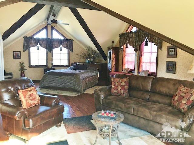 59373 Hop Patch Spring Road Mountain Center, CA 92561 - Photo 18 of 41 a living room with furniture and a large window